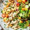 Colorful FODMAP-friendly dinner plate with vegetables and protein.