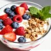 Healthy yogurt parfait with berries and granola.