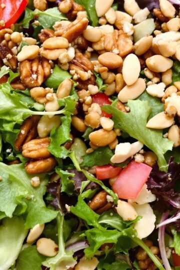 Salad with mixed greens and assorted healthy nuts.