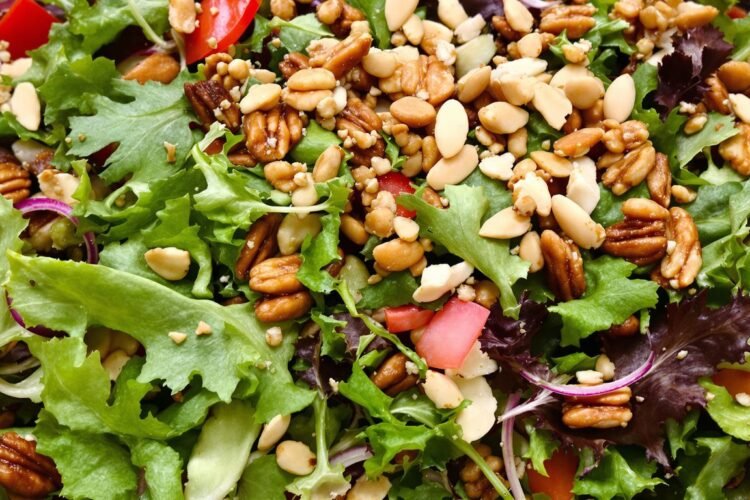 Salad with mixed greens and assorted healthy nuts.