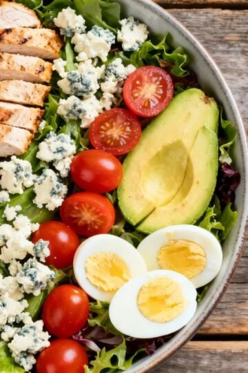Fresh Cobb salad with chicken, bacon, and vegetables
