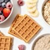 Healthy frozen breakfast meals with fruits and grains.