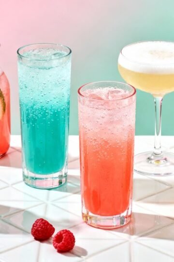 Assortment of colorful non-alcoholic drinks for 2025.