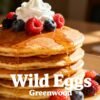 Delicious brunch pancakes with berries at Wild Eggs Greenwood.