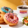 Dunkin' Donuts breakfast spread with coffee and donuts.