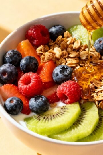 Healthy breakfast bowl with fruits and granola