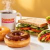 Dunkin' Donuts breakfast spread with coffee and donuts.