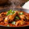 Authentic Mangalorean chicken curry in a bowl with rice.