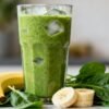 Healthy green smoothie with banana and spinach