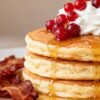 Pancakes with berries and bacon at Wild Eggs Downtown.