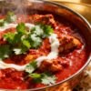 Authentic Indian spicy chicken curry in a bowl.