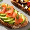 Assortment of delicious open-faced sandwiches with fresh toppings.
