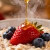 Healthy oatmeal with berries and honey